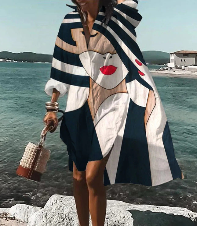 Navy and white beach mini shirt dress with bold face graphic print and oversized shirt style