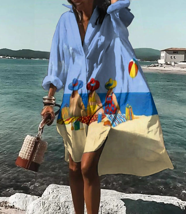 Light blue beach mini shirt dress with beach scene print, long sleeves, and flowy casual fit