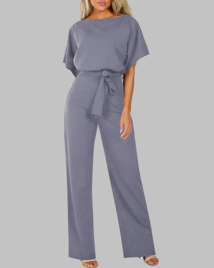 Slate blue belted wide leg jumpsuit with batwing sleeves and tie waist