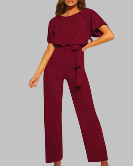 Burgundy belted wide leg jumpsuit with batwing sleeves and tie waist