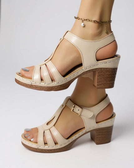 Ivory strappy platform sandals with block heel, T-strap design, and textured sole