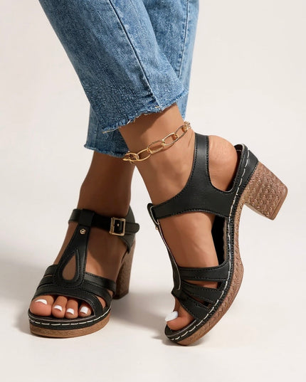 Black strappy platform sandals with chunky block heel and buckle ankle strap