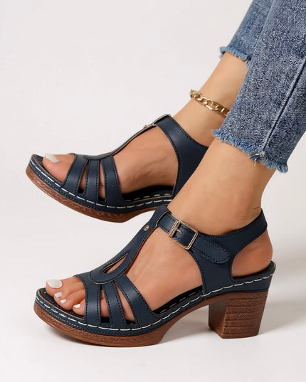 Navy blue strappy block heel sandals with ankle strap and textured platform sole