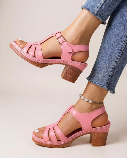Pink strappy block heel sandals with ankle strap and platform sole