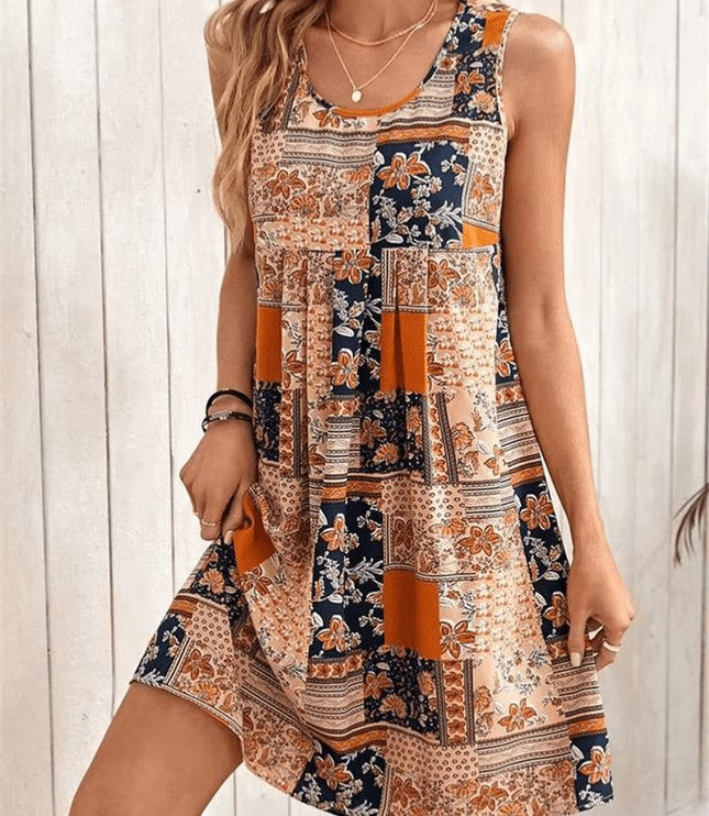 Sleeveless summer patchwork mini dress with orange, navy, and floral print panels
