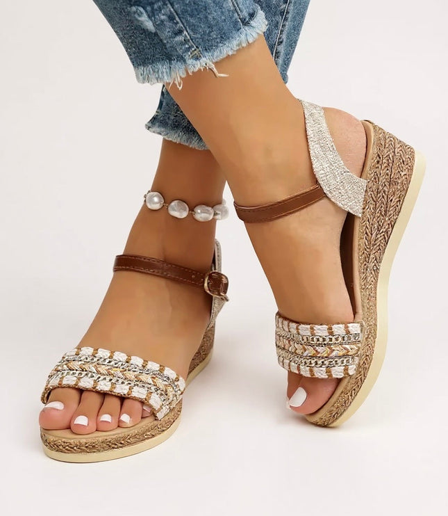 Braided wedge sandals with chain detail and brown ankle strap, worn with pearl bracelet