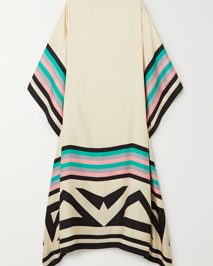 Back view of cream maxi dress with geometric black and multicolor striped hem detail