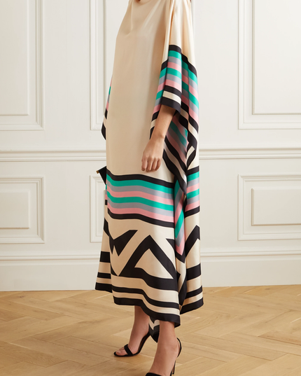 Beige and multicolor geometric maxi dress with teal, pink, and black striped accents
