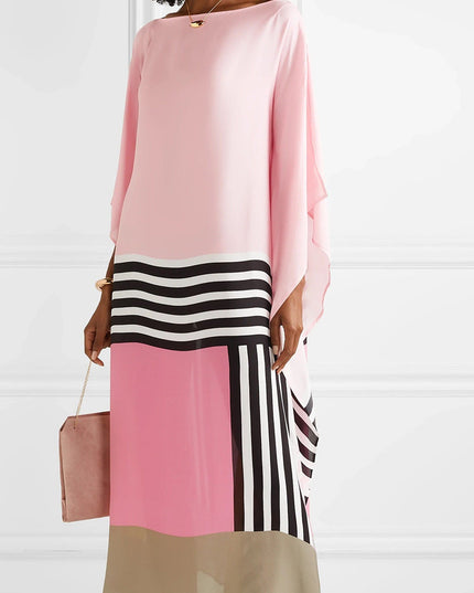 Back view of pink maxi dress with striped and color block geometric pattern details