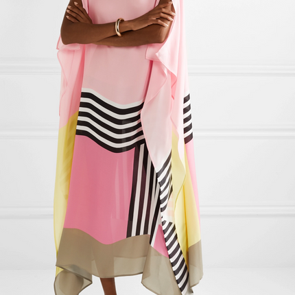 Women's maxi dress with pink, yellow, and beige color blocks and black striped geometric pattern