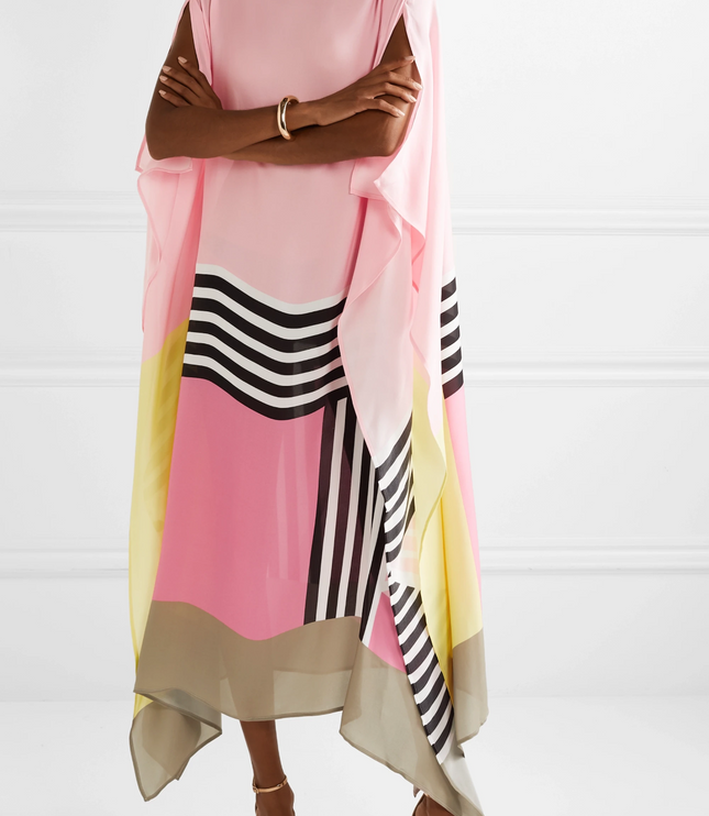 Women's maxi dress with pink, yellow, and beige color blocks and black striped geometric pattern