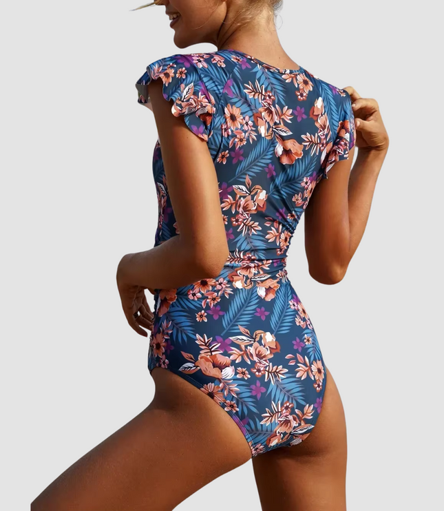 Back view of tropical floral one piece bathing suit with ruffled sleeves