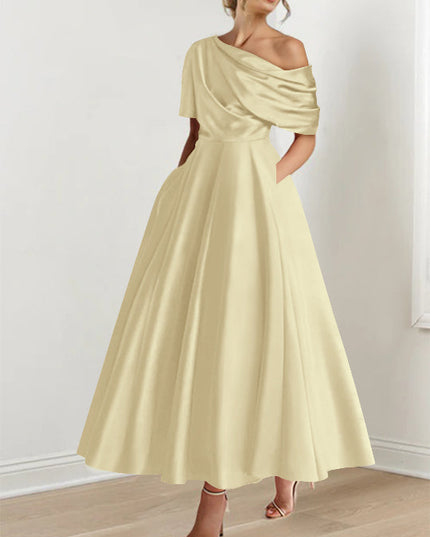 Pale yellow off-shoulder maxi dress with half-sleeve drape and A-line skirt