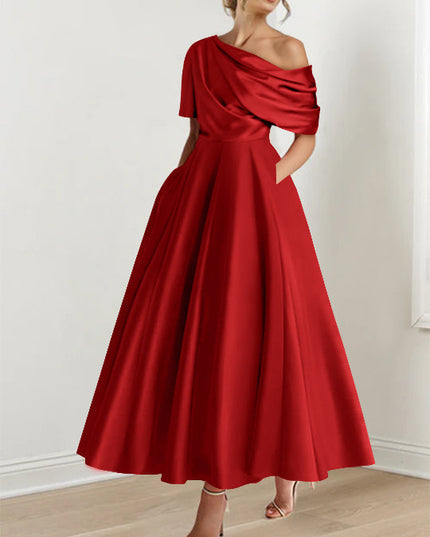 Crimson red one-shoulder maxi dress with draped half-sleeve and full skirt