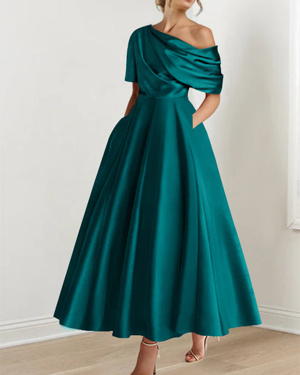 Teal one-shoulder maxi dress with draped half-sleeve and full skirt