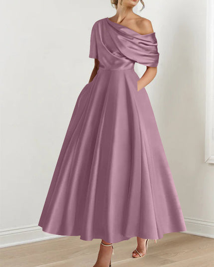 Dusty mauve off-shoulder maxi dress with draped half-sleeve and full skirt