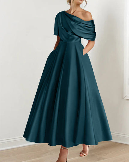 Teal one-shoulder maxi dress with half-sleeve drape and voluminous skirt