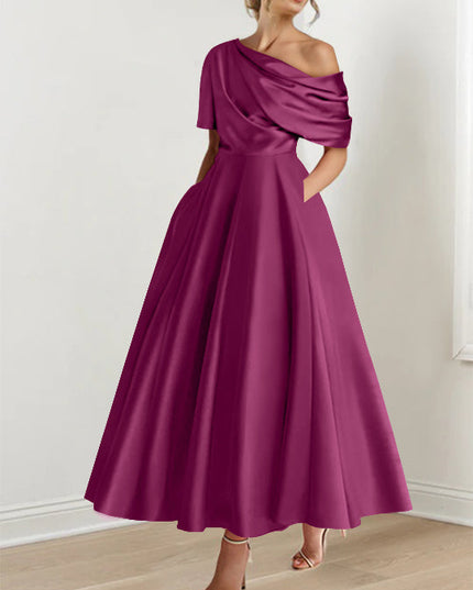 Burgundy one-shoulder maxi dress with elegant draped neckline