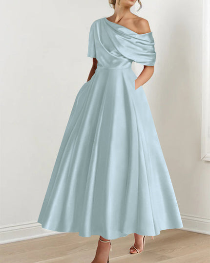 Light gray off-shoulder maxi dress with flowing half-sleeves and A-line skirt