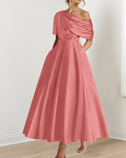 Coral pink off-shoulder maxi dress with half-sleeves and flowing skirt