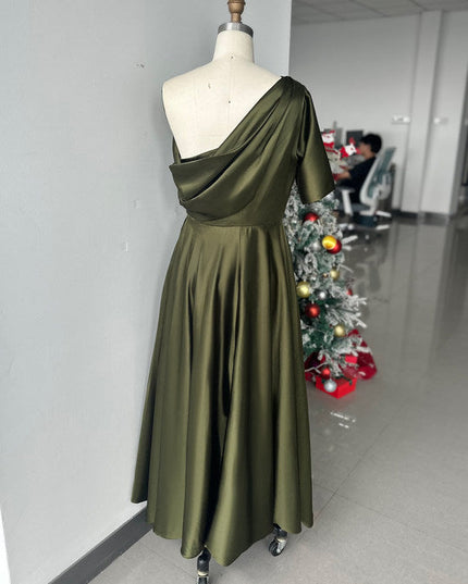 Back view mannequin display of olive one-shoulder maxi dress