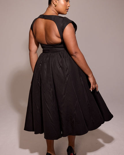 Plus size black open back midi dress with cap sleeves and flared skirt