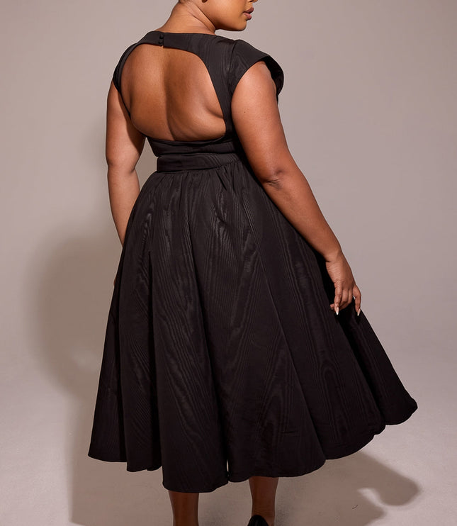 Plus size black open back midi dress with cap sleeves and flared skirt
