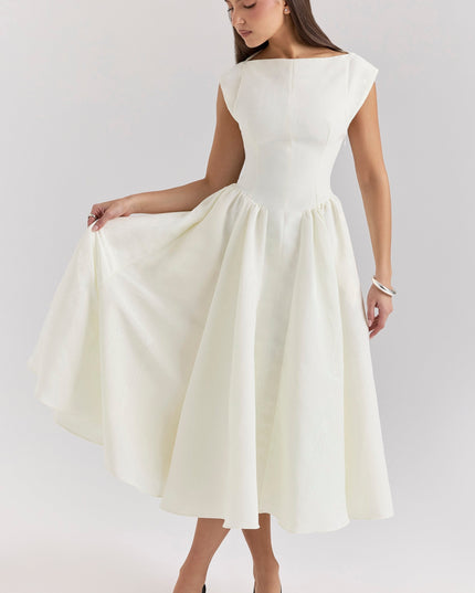 Rear angled view of ivory midi cocktail dress with open back detail
