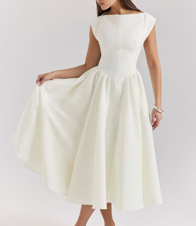 Rear angled view of ivory midi cocktail dress with open back detail