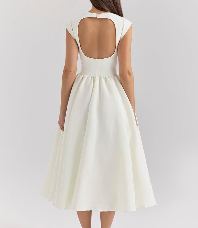 Back view of ivory midi dress with large open back and flared skirt