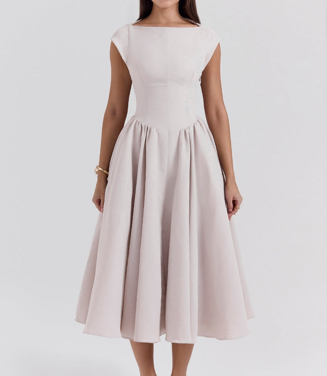 Back view of blush midi cocktail dress with open back and full skirt