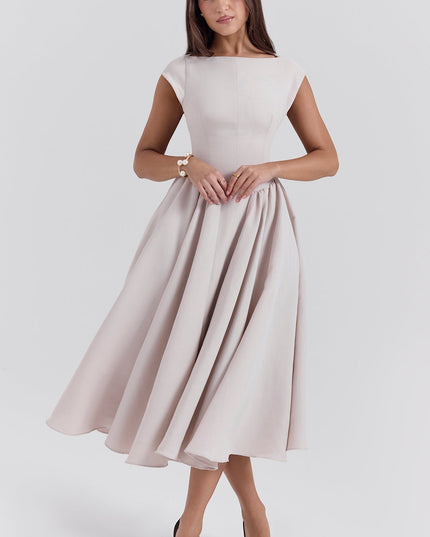 Front view of a blush midi dress with cap sleeves, fitted waist, and full skirt