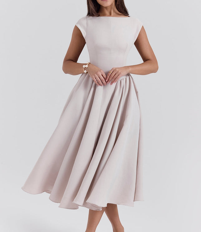 Front view of a blush midi dress with cap sleeves, fitted waist, and full skirt