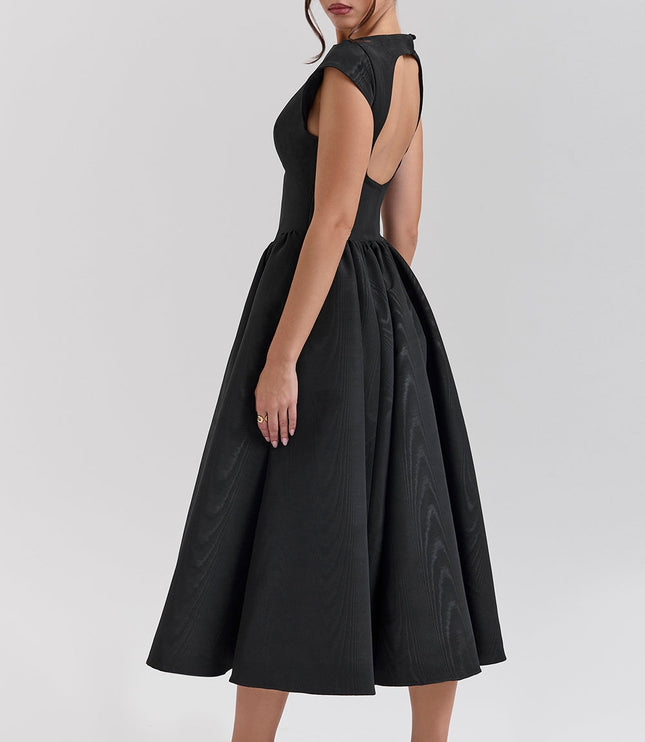 Rear side view of black cocktail midi dress showing open back and cap sleeves