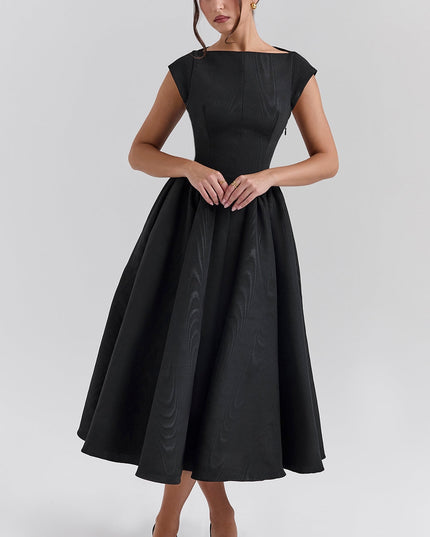Back view of black midi dress with deep open back and voluminous skirt