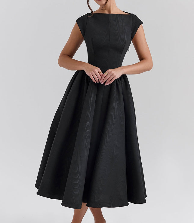 Back view of black midi dress with deep open back and voluminous skirt