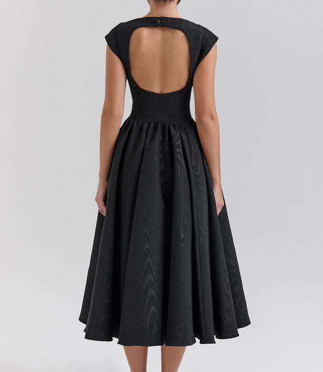 Front view of black open back midi dress with boat neckline and full skirt