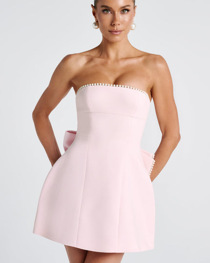 Light pink strapless mini dress with pearl-beaded neckline and side pockets