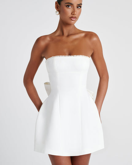 White strapless mini dress with pearl beaded neckline and fitted bodice