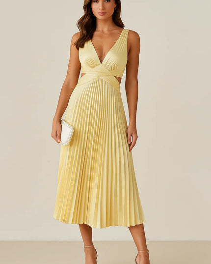 Sleeveless yellow pleated midi dress with v-neck and side cutouts, paired with nude heels and a pearl clutch.
