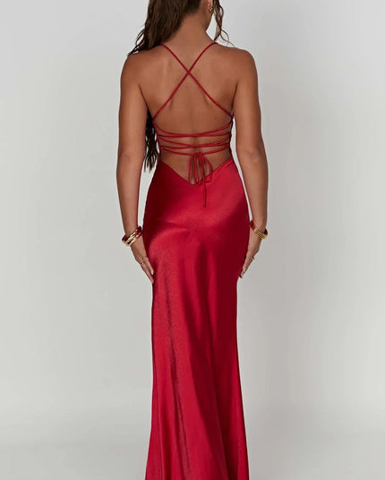 Back view of red satin maxi dress with crisscross straps and tie detail