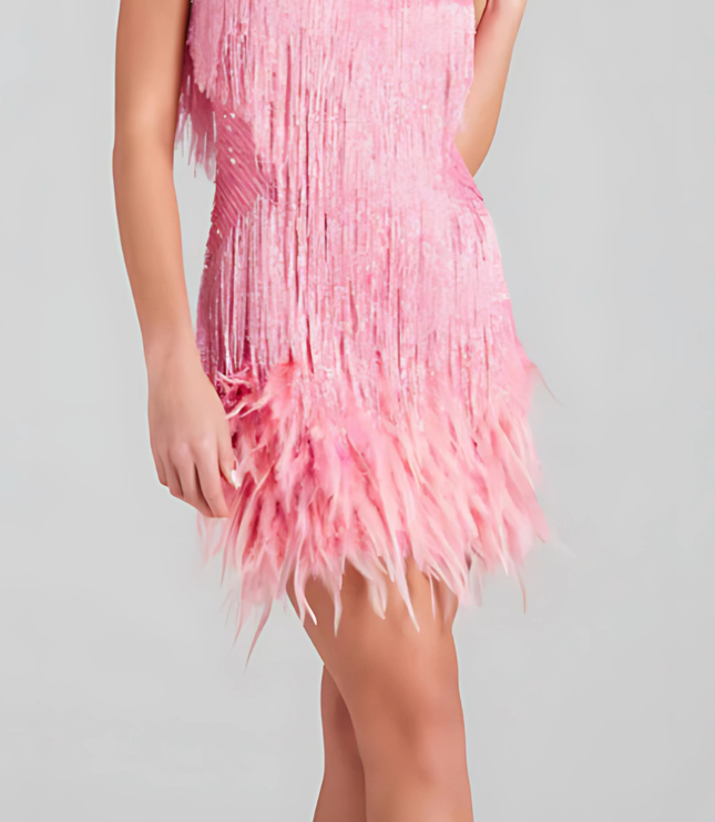 Side view of pink sequin fringe cocktail dress with v-neckline