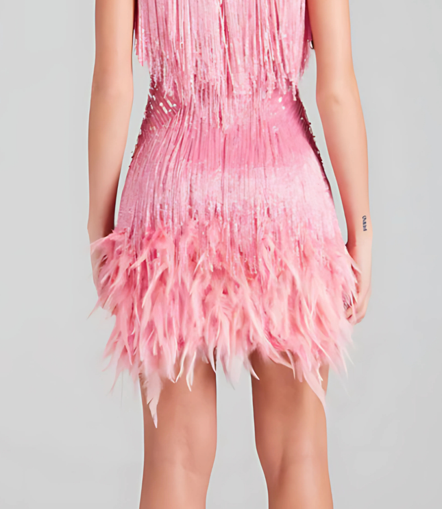 Back view of pink sequin fringe mini dress with spaghetti straps