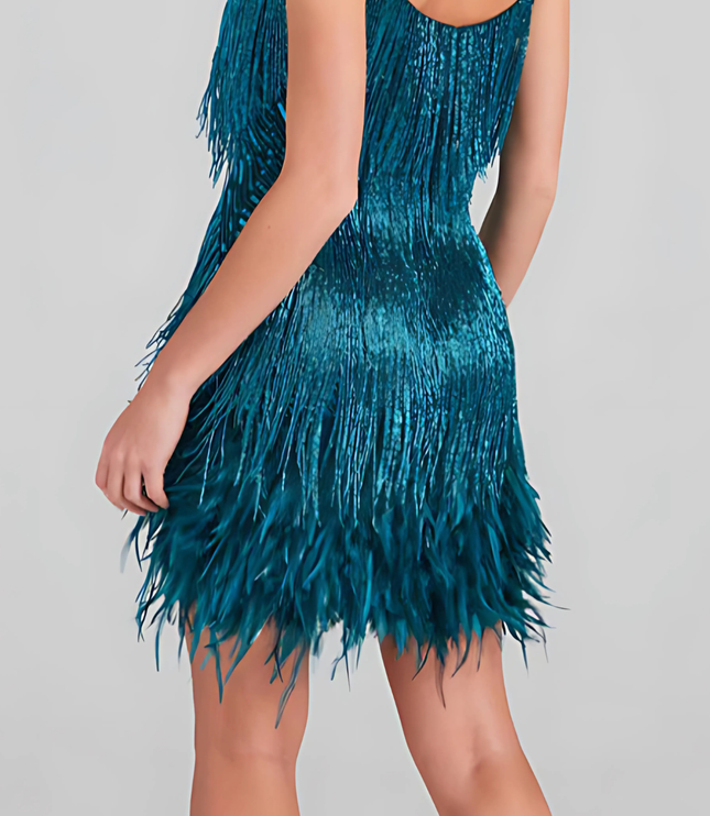 Back view of teal sequin fringe mini dress with open back