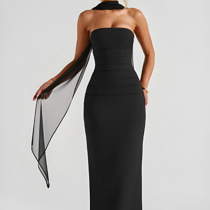 Black strapless bodycon maxi dress with halter neck collar and flowing sheer overlay