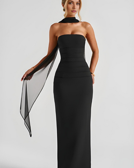 Black strapless bodycon maxi dress with halter neck collar and flowing sheer overlay