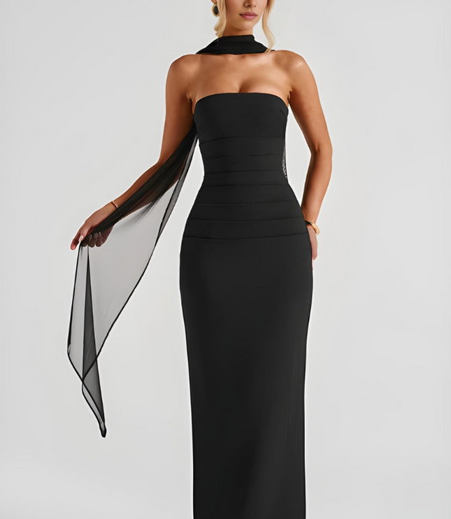Black strapless bodycon maxi dress with halter neck collar and flowing sheer overlay