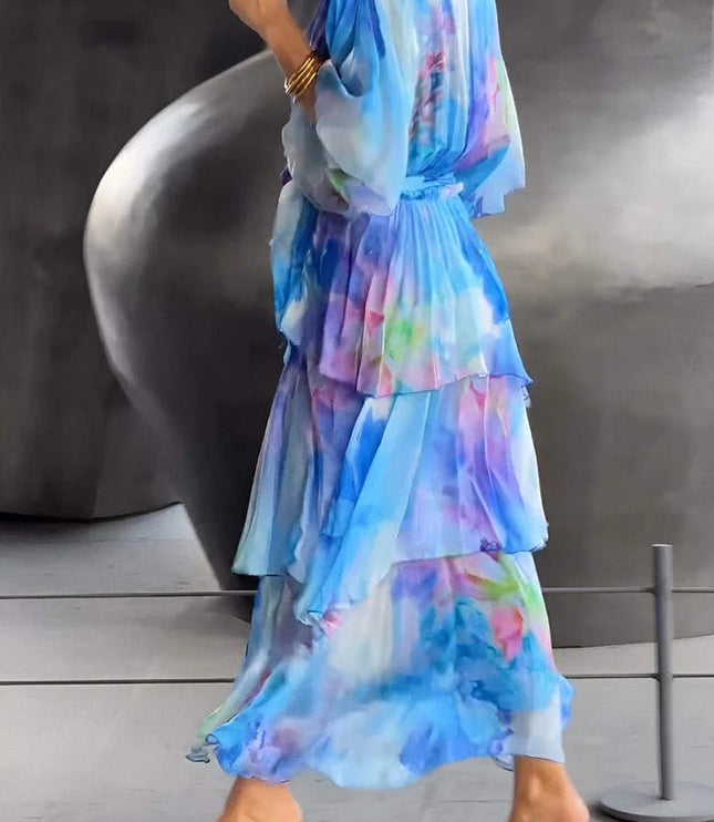Back view of watercolor floral midi dress showing tiered ruffled skirt detail