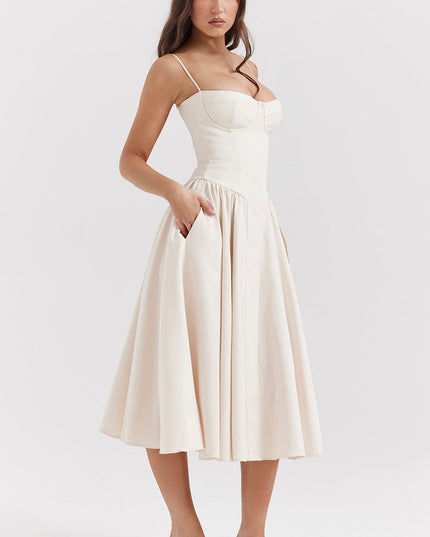 Cream adjustable strap midi dress with fitted bodice and flowing skirt, front view