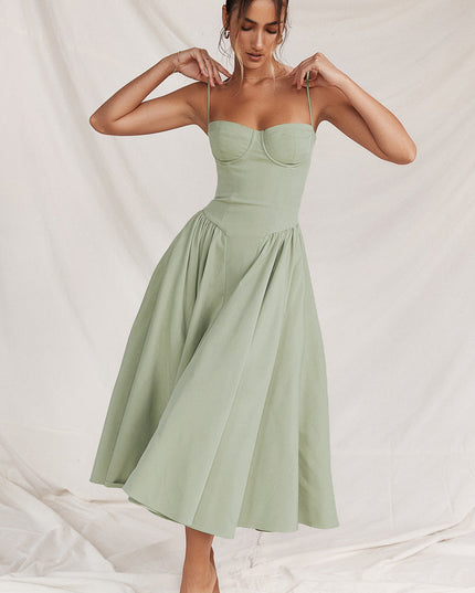 Light green cocktail midi dress with adjustable straps, corset bodice, and full skirt